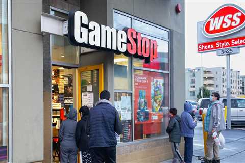 GameStop slides 10% as the video game retailer reports a 2nd-quarter loss and offers little..