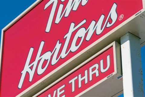 A Tim Hortons employee threw hot coffee at a customer who swore at her, a lawsuit says